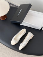 Cream tweed ballet flats, lace-up bow detail and embroidered branding