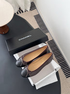 Chanel pair of ballet flats with bows and logo, round toe