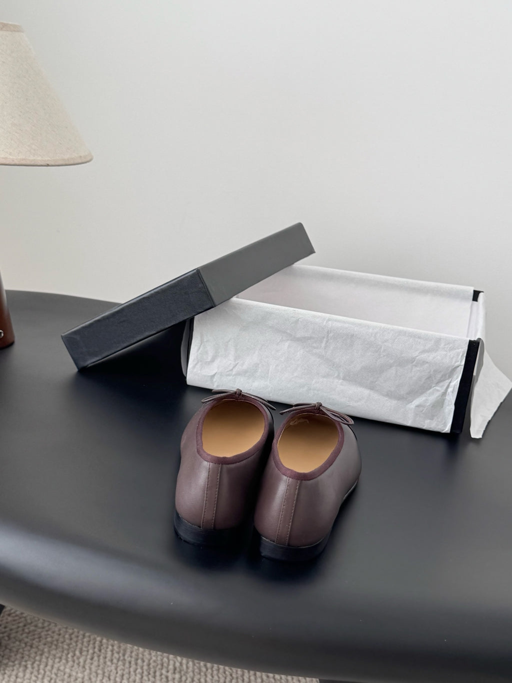 Chanel pair of ballet flats, dark gray with mauve bows and logo