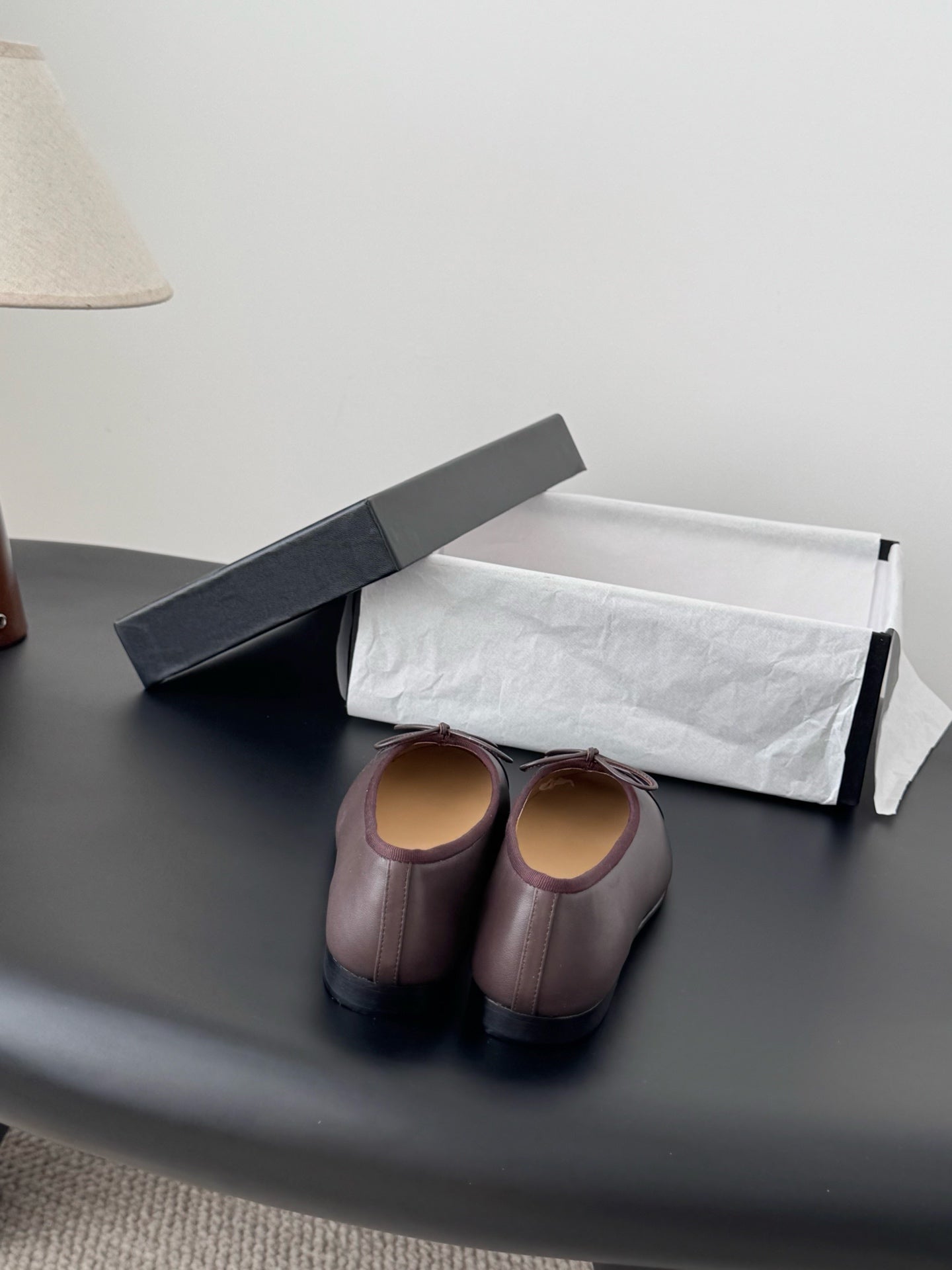 Chanel pair of ballet flats, dark gray with mauve bows and logo