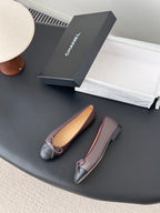 Chanel logo ballet flats with bow, rounded toe and low profile