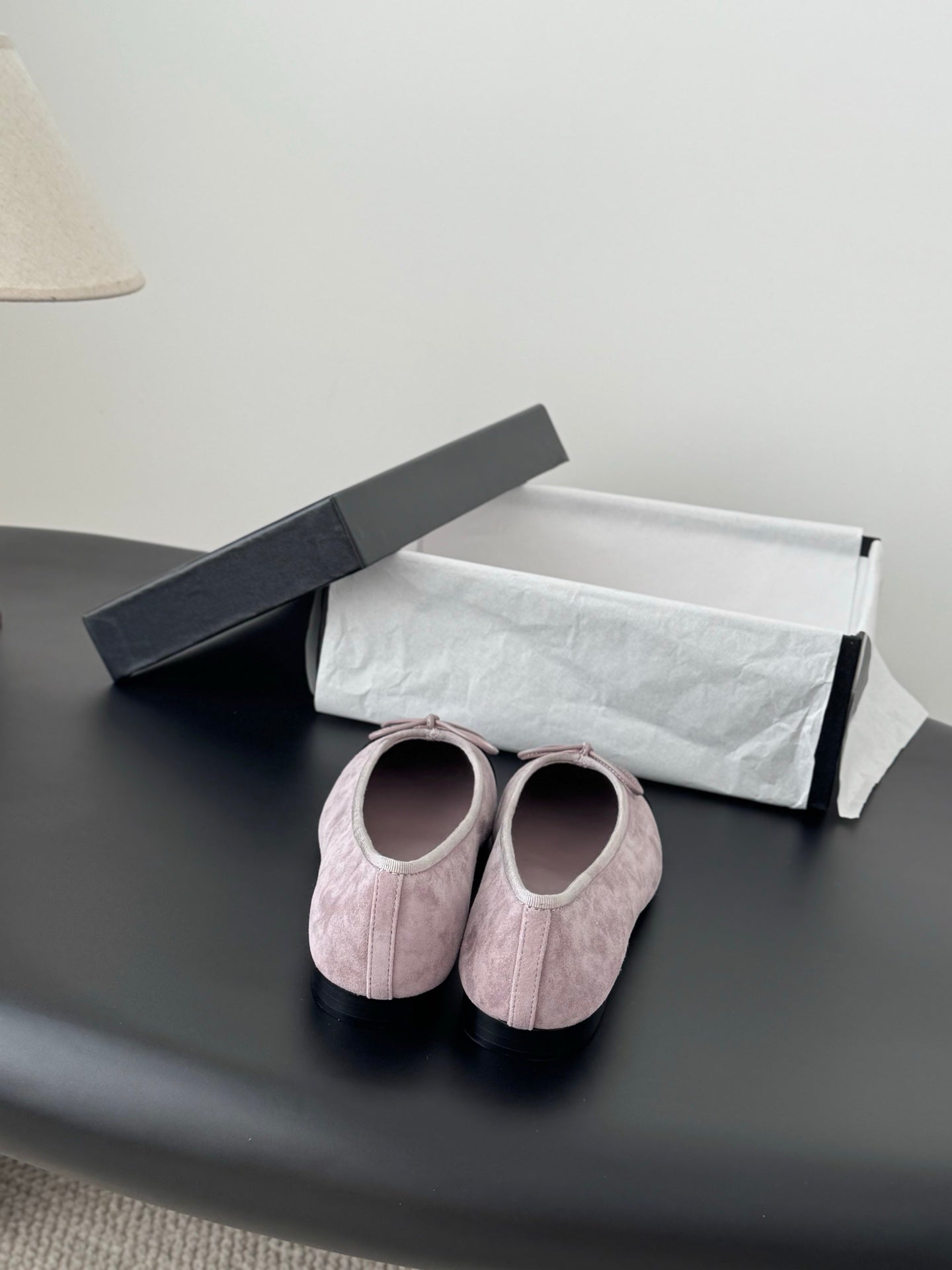 Chanel pair of mauve suede ballet flats with black toe caps and pink tie bows