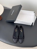 Dark fabric lace-up ballet flats with bow ties and logo insoles