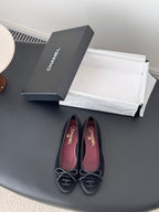 Chanel womens ballet flats, dark fabric, lace-up ribbon bows, pointed toe