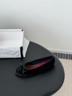 Chanel womens ballet flats, dark fabric, lace-up ribbon bow, side view