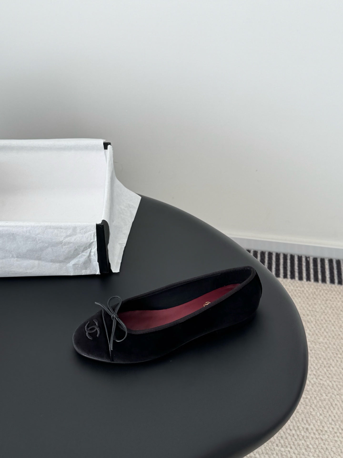 Chanel womens ballet flats, dark fabric, lace-up ribbon bow, side view