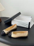 Chanel ladies flats, beige upper with black sides and bow laces