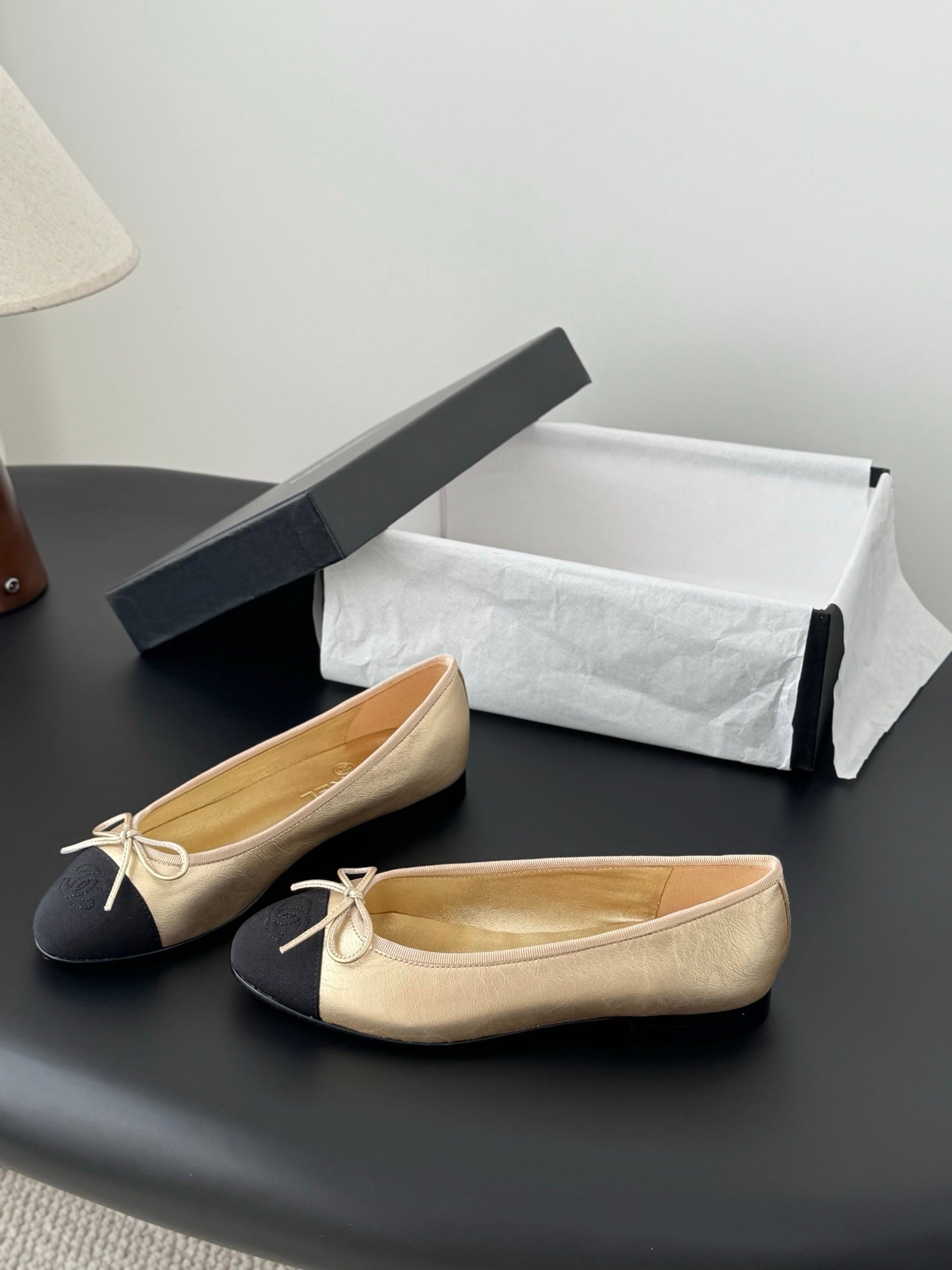 Chanel ladies flats, beige upper with black sides and bow laces