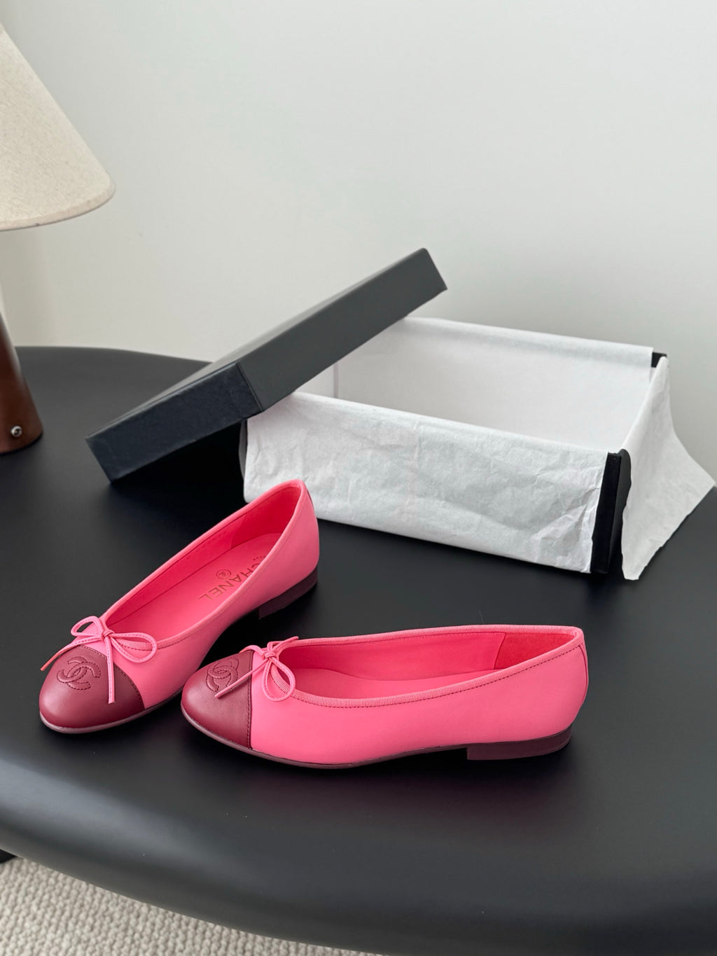 Pink Chanel ballet flats with ribbon bow and smooth rounded toe