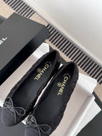 Chanel ladies dark glitter ballet flats with bow ties, shown with CHANEL-branded insole