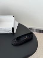 Chanel ladies dark glitter ballet flat with bow tie and round toe, side angle