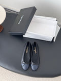 Pair of CHANEL dark blue ballet flats with ribbon bow and round toe
