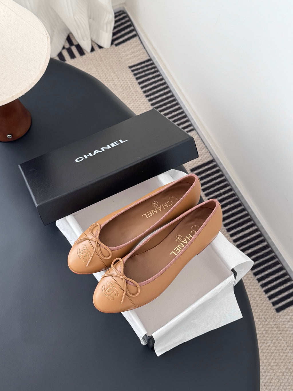 Tan Chanel ballet flats with bow and embossed logo, with gift box