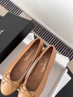 Tan Chanel ballet flats with bow, logo insoles