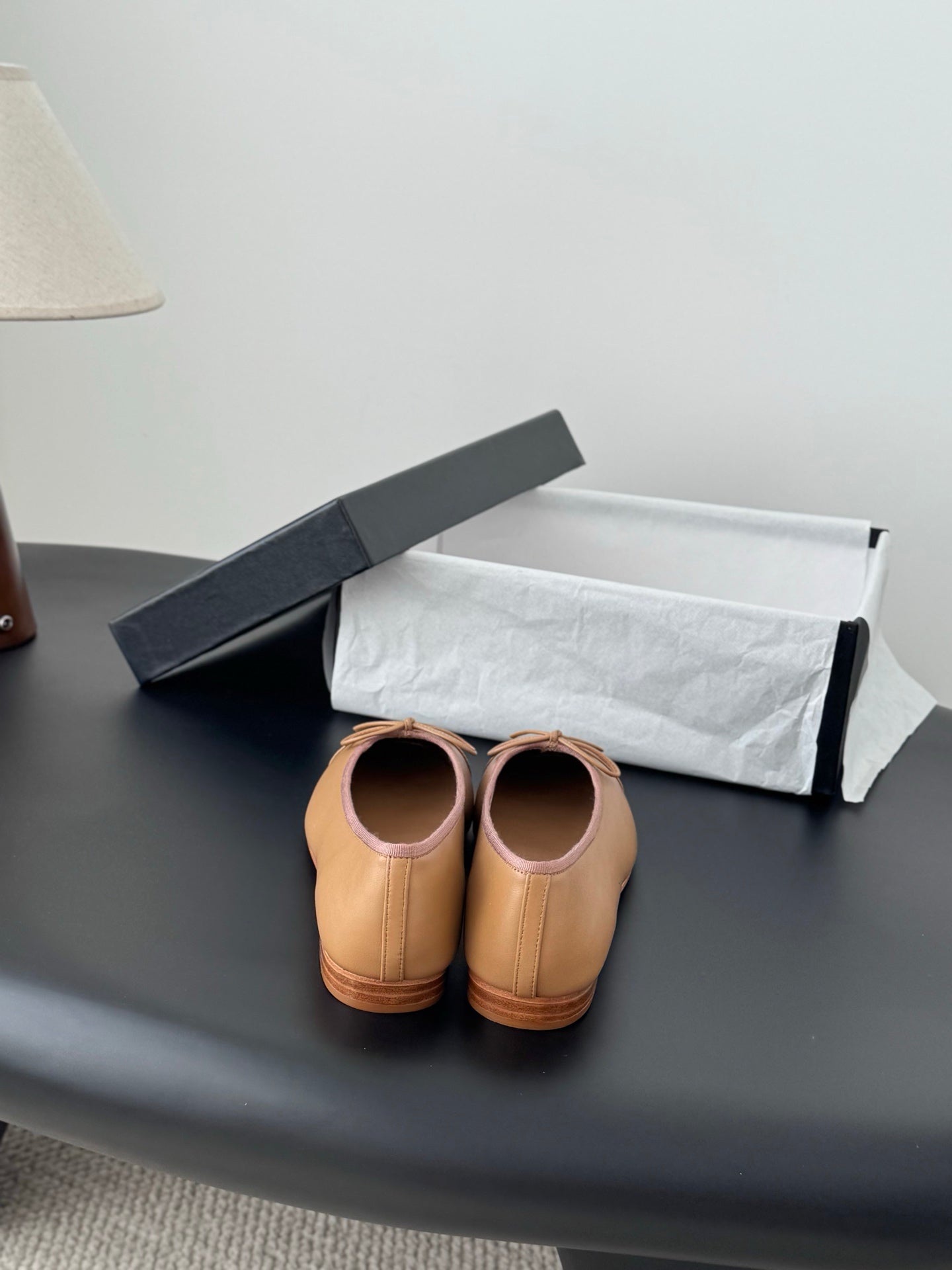 Tan Chanel ballet flats with bow detail, rear view
