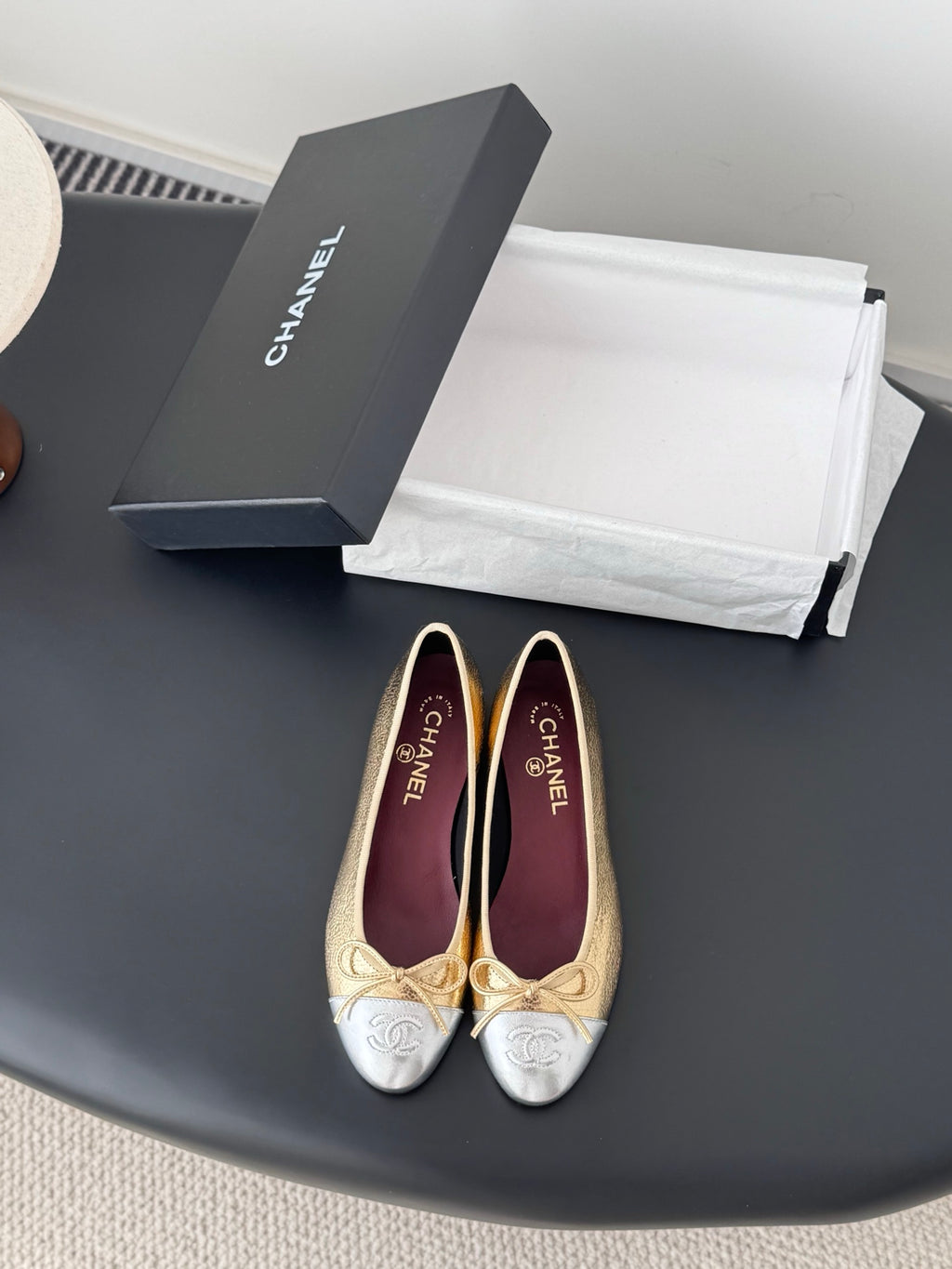 Chanel ladies ballet flats in gold and cream with bow-tie laces