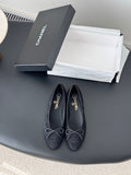 Women's dark navy lace-up ballet flats with bow ties, rounded toe