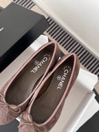 Chanel ladies ballet flats, mauve pink with bow and Chanel logo insoles