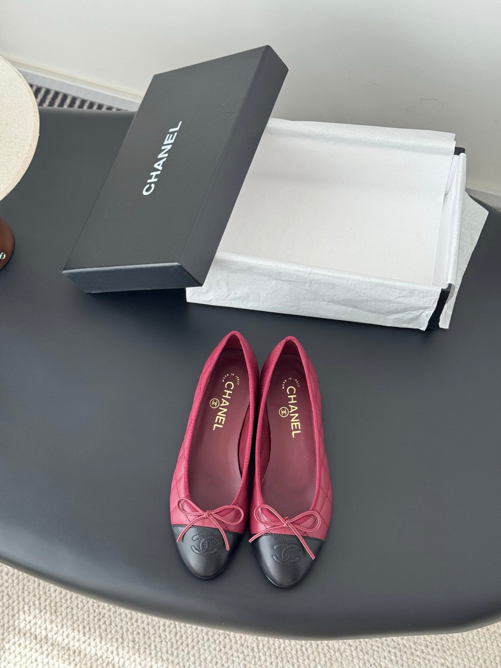 Quilted ballet flats, pink upper with black toe cap and bow laces
