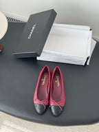 Quilted ballet flats, pink upper with black toe cap and bow laces