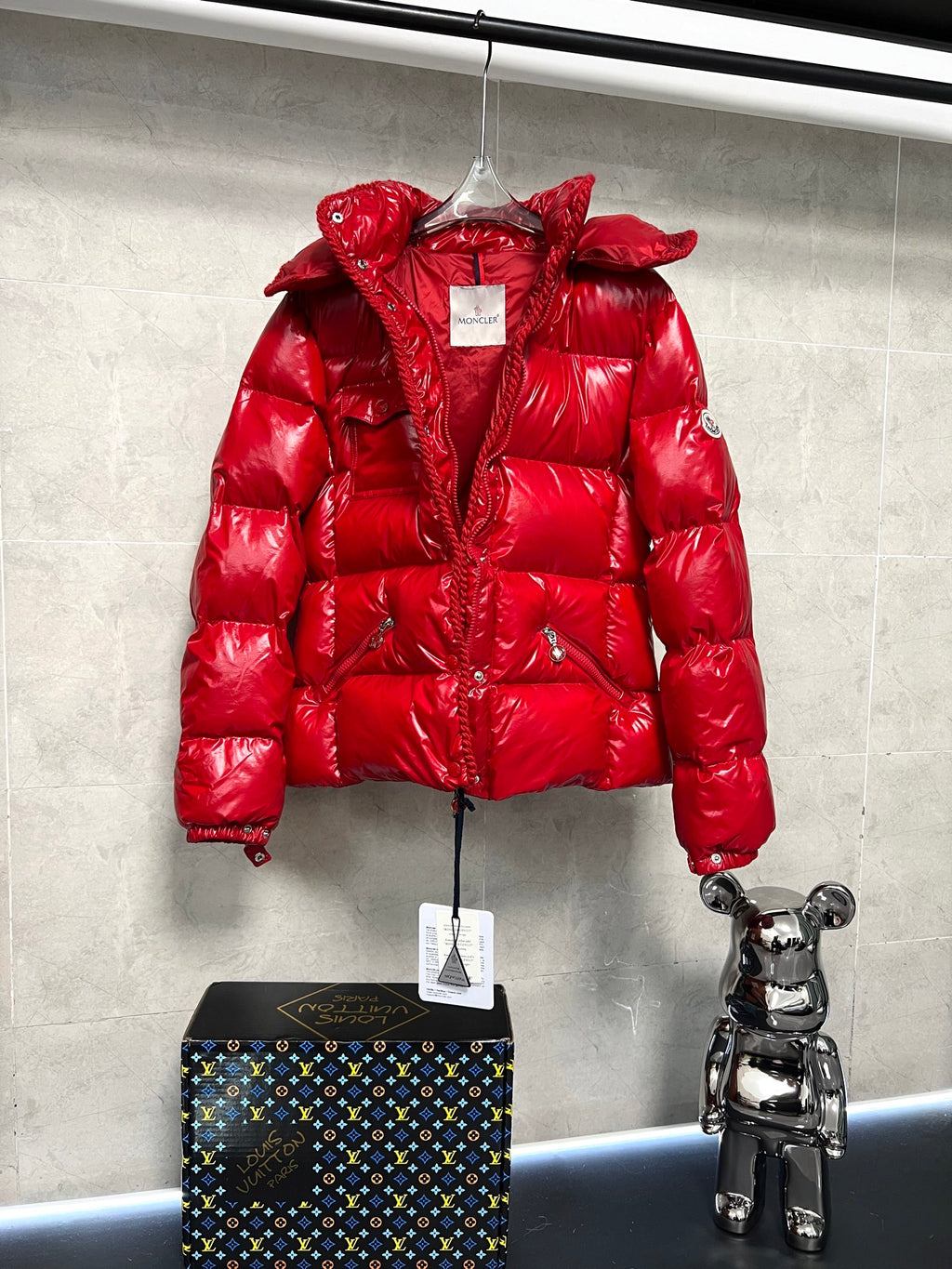 Moncler long red puffer jacket with hood, diamond-quilted design, front zipper