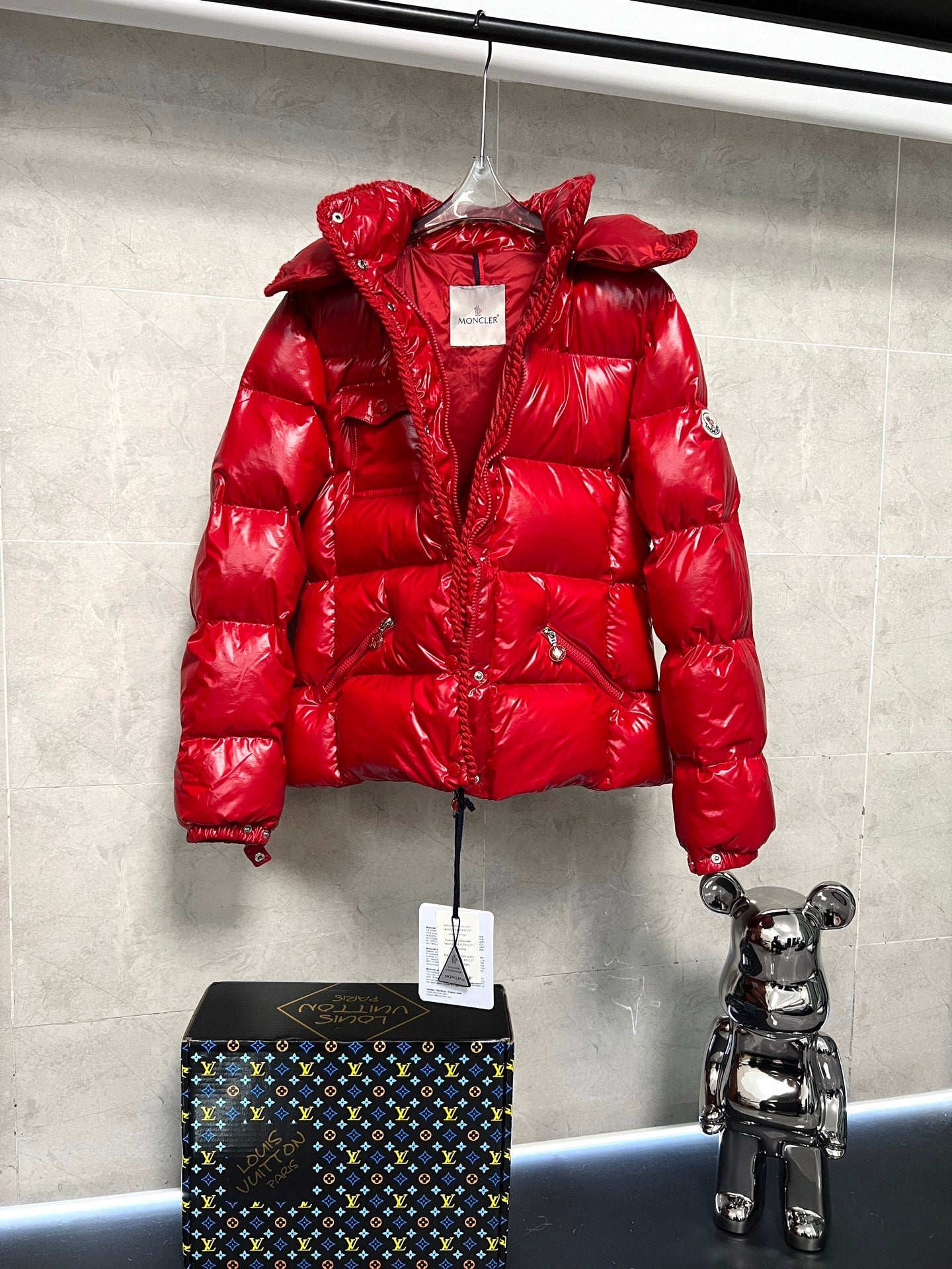 Moncler long red puffer jacket with hood, diamond-quilted design, front zipper