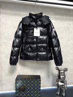 Moncler long puffer jacket, glossy black, hooded with front zip and stitched panels
