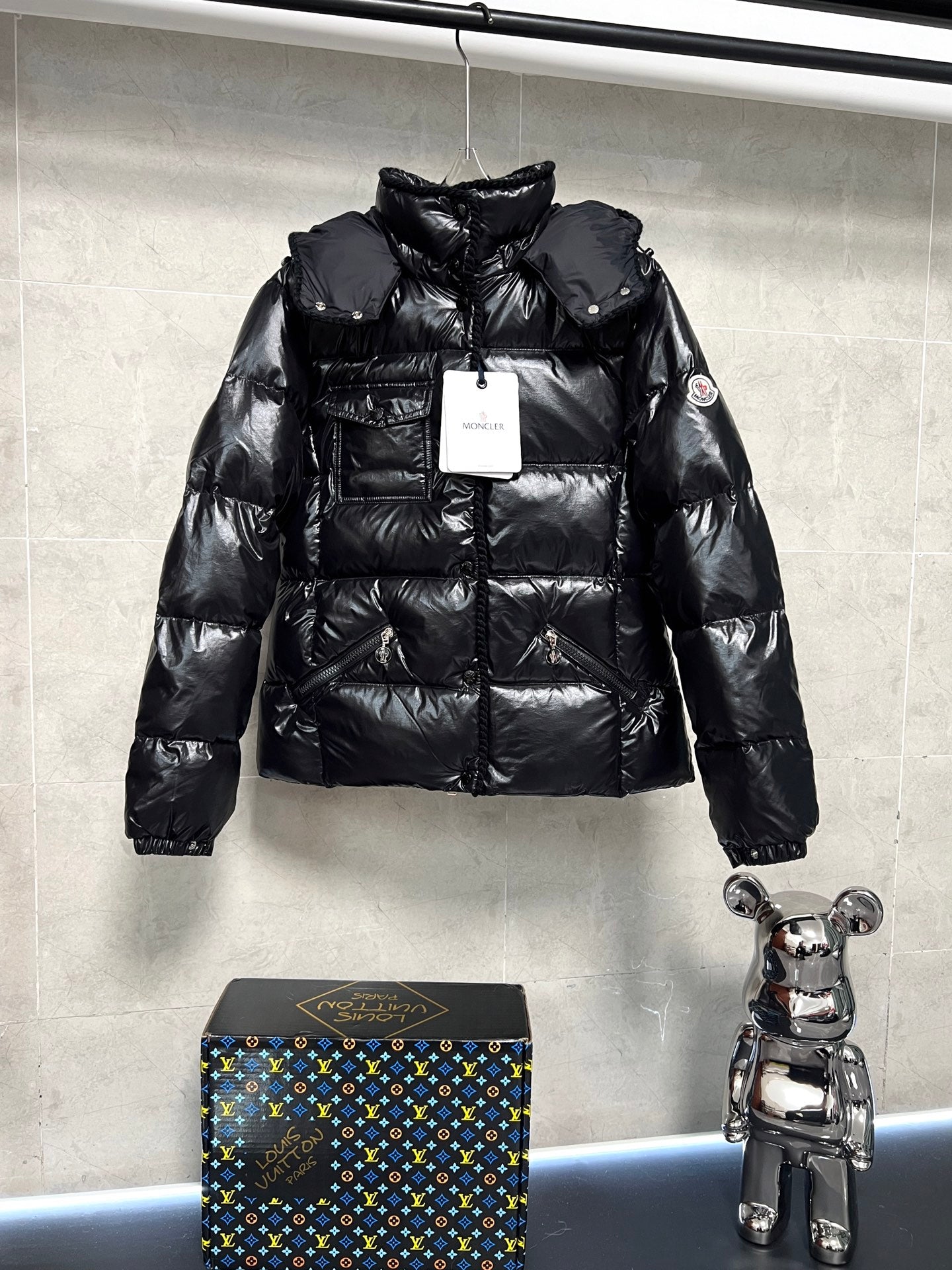 Moncler long puffer jacket, glossy black, hooded with front zip and stitched panels