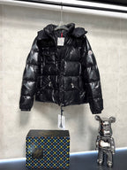 Moncler long puffer jacket, glossy black hood and quilted front with front zip