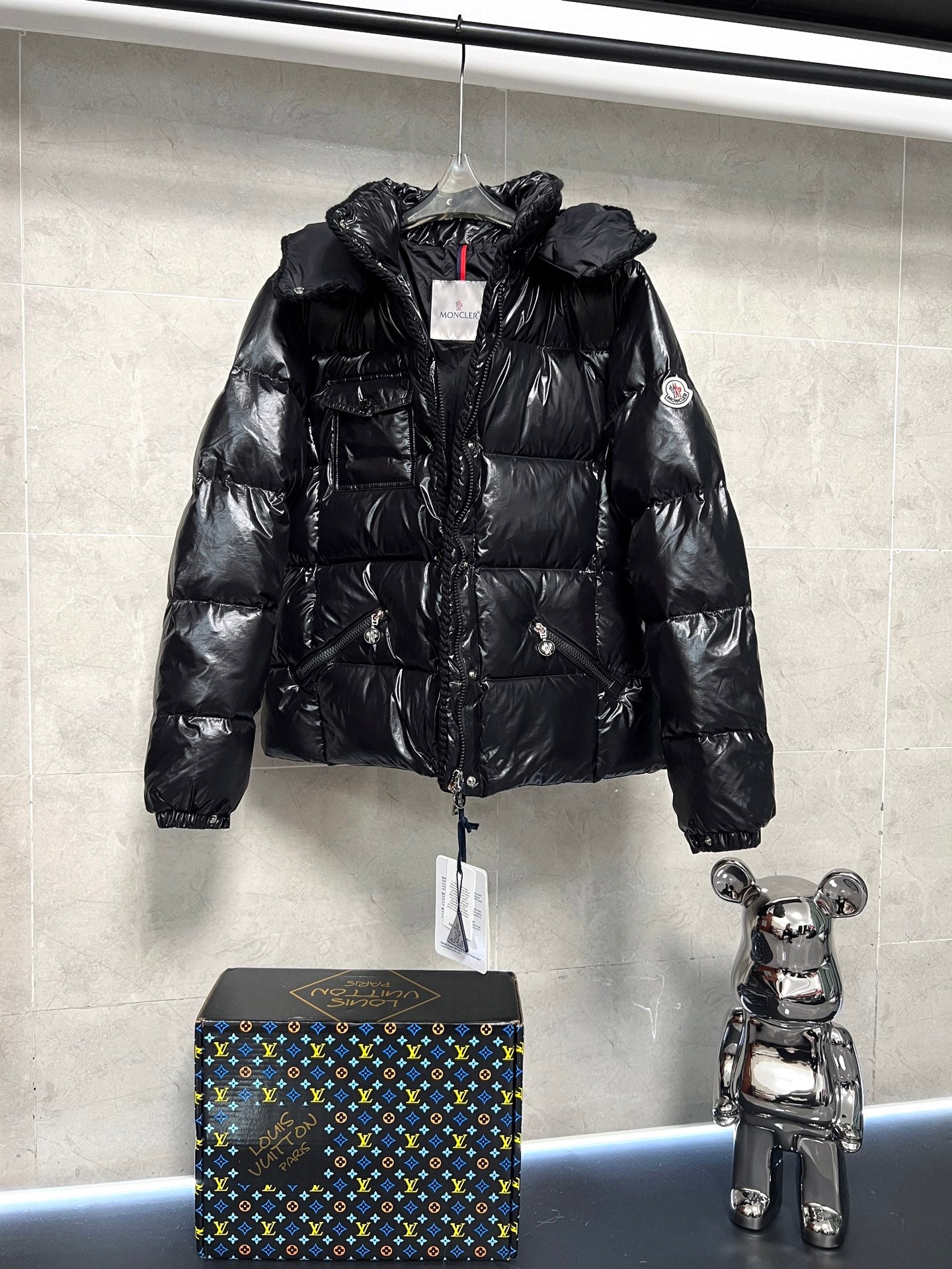 Moncler long puffer jacket, glossy black hood and quilted front with front zip