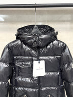 Moncler long puffer jacket, glossy black hooded puffer with front zipper and hanging tags