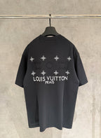 Louis Vuitton short-sleeve T-shirt, dark charcoal, back floral logo and “PRAIS” text