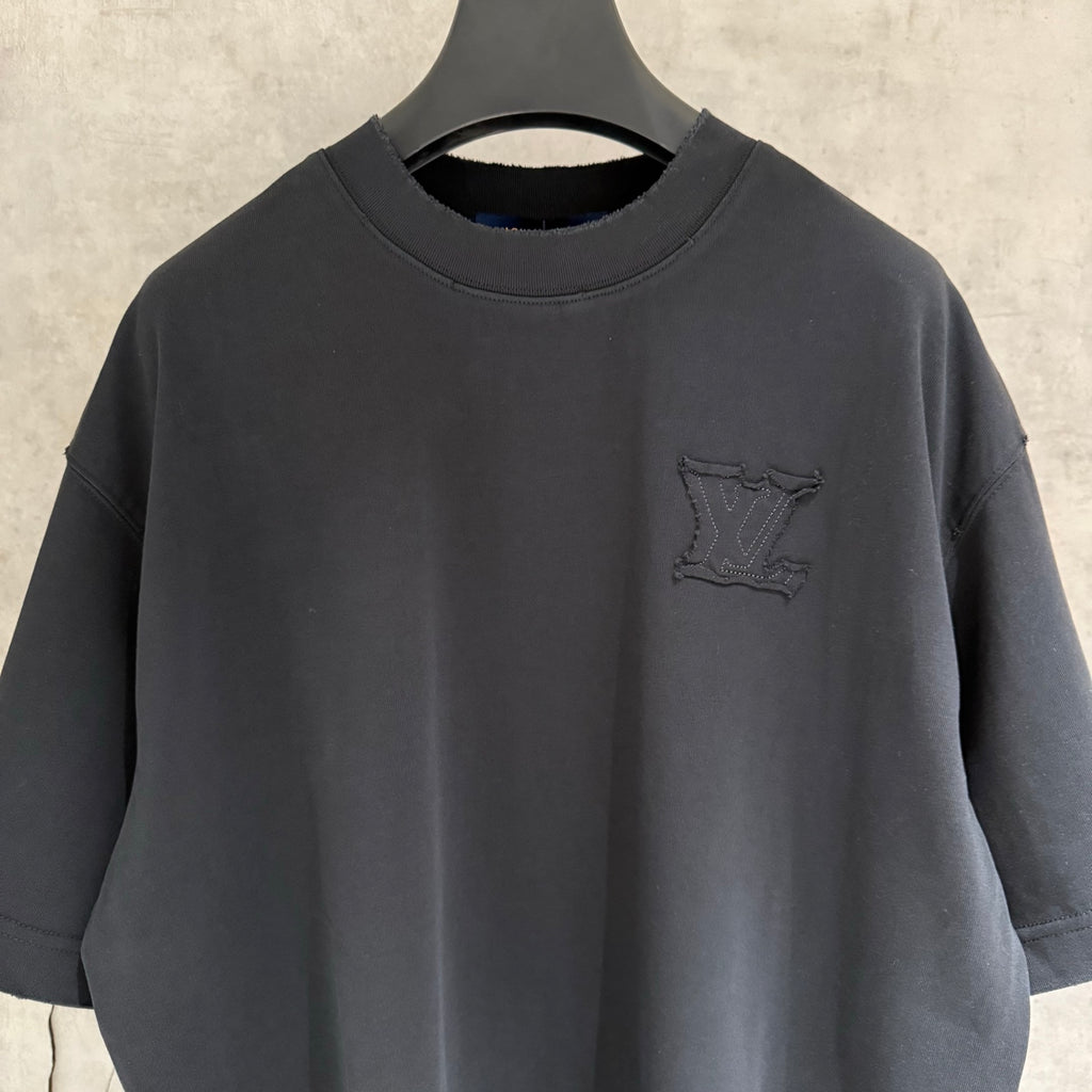 Louis Vuitton short-sleeve T-shirt, dark charcoal, close-up of chest logo patch