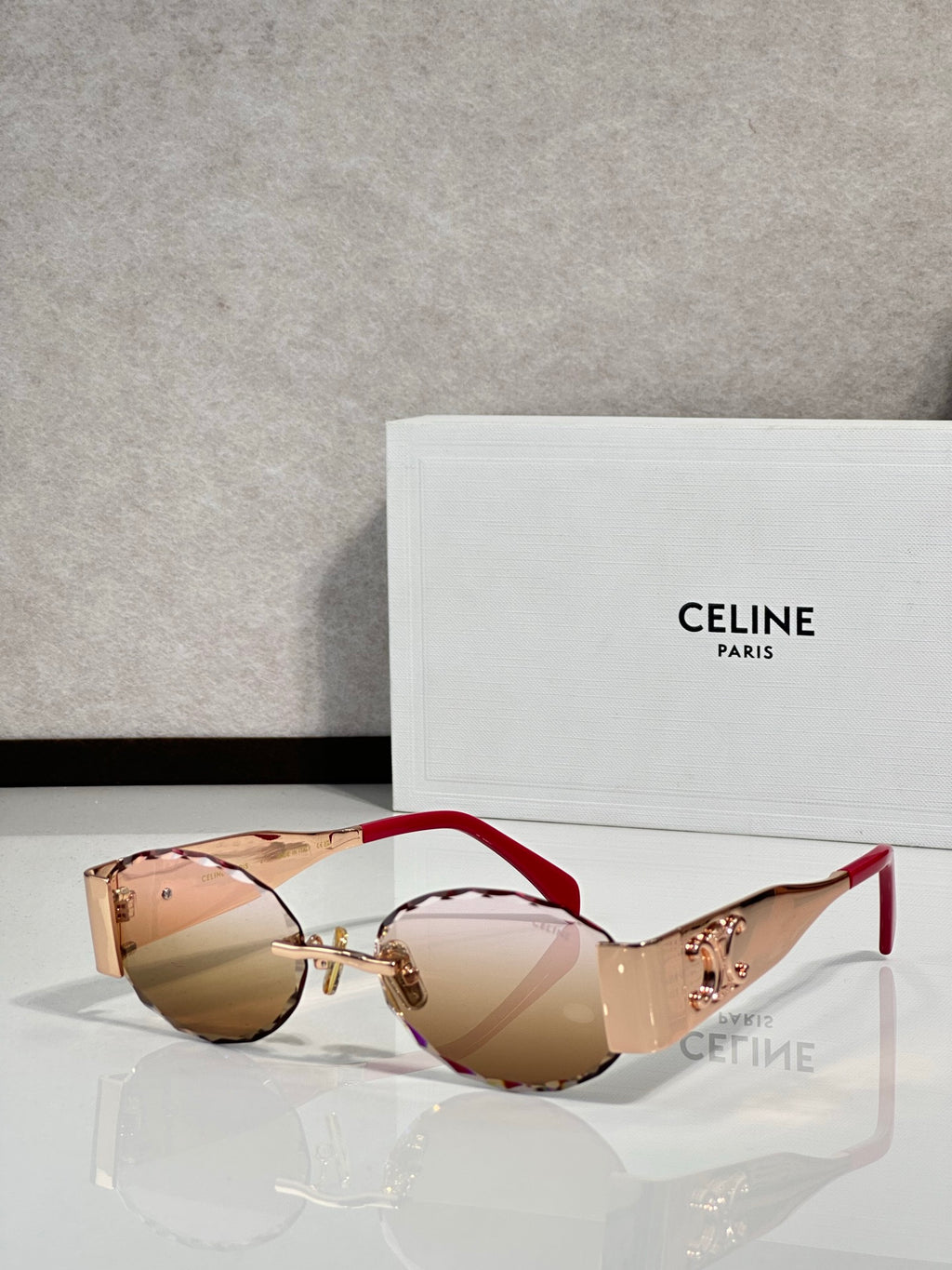 Celine sunglasses with tan lenses and red frames