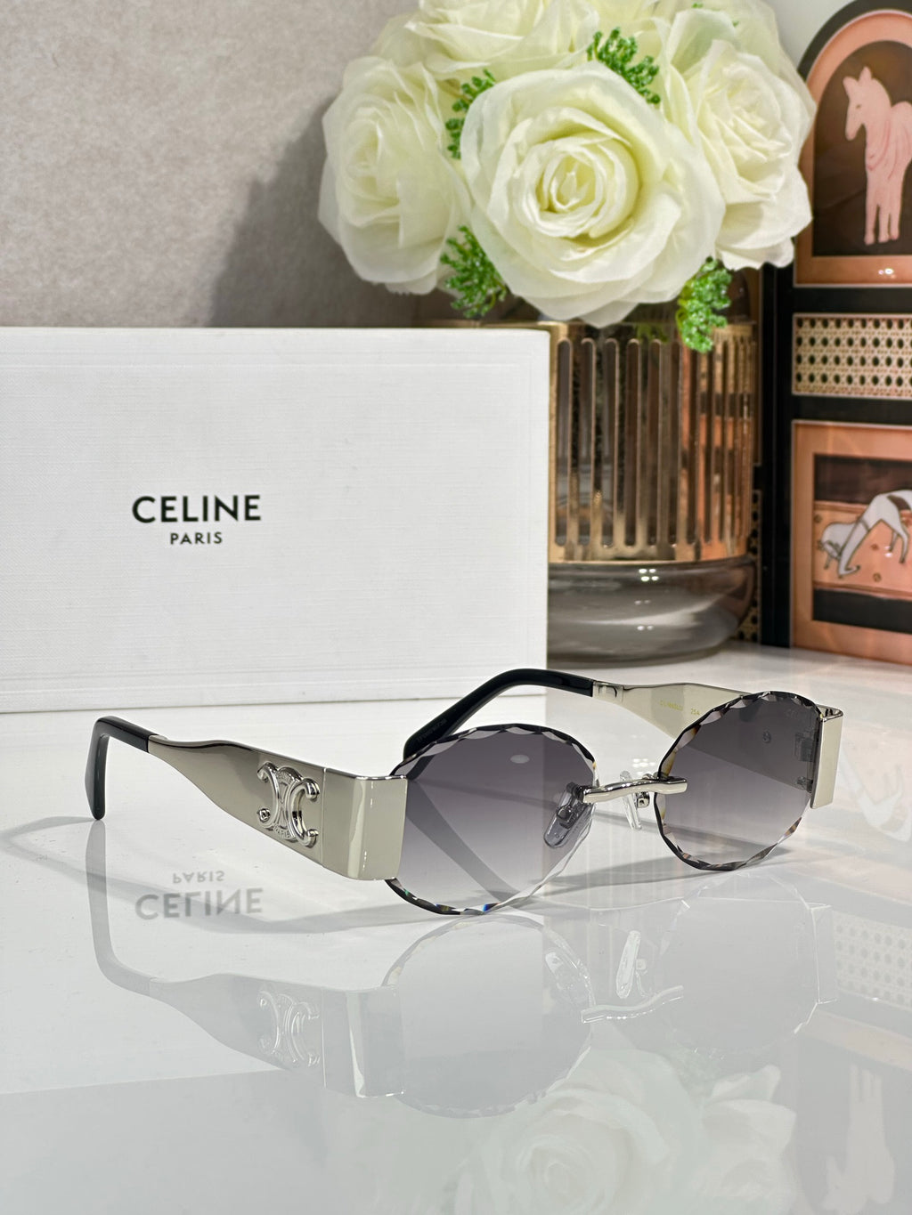 Celine sunglasses with gray lenses and clear-to-black frames