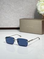 Sunglasses with blue lenses, metal frame with black and gold-tone arms