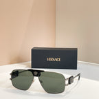 Versace sunglasses with dark green lenses, black frame, and gold logo detail