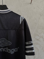 Balenciaga black polo shirt back with graphic print and striped sleeve band