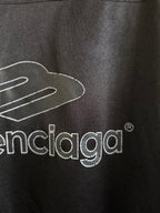 Balenciaga black polo back close-up of balenciaga logo print