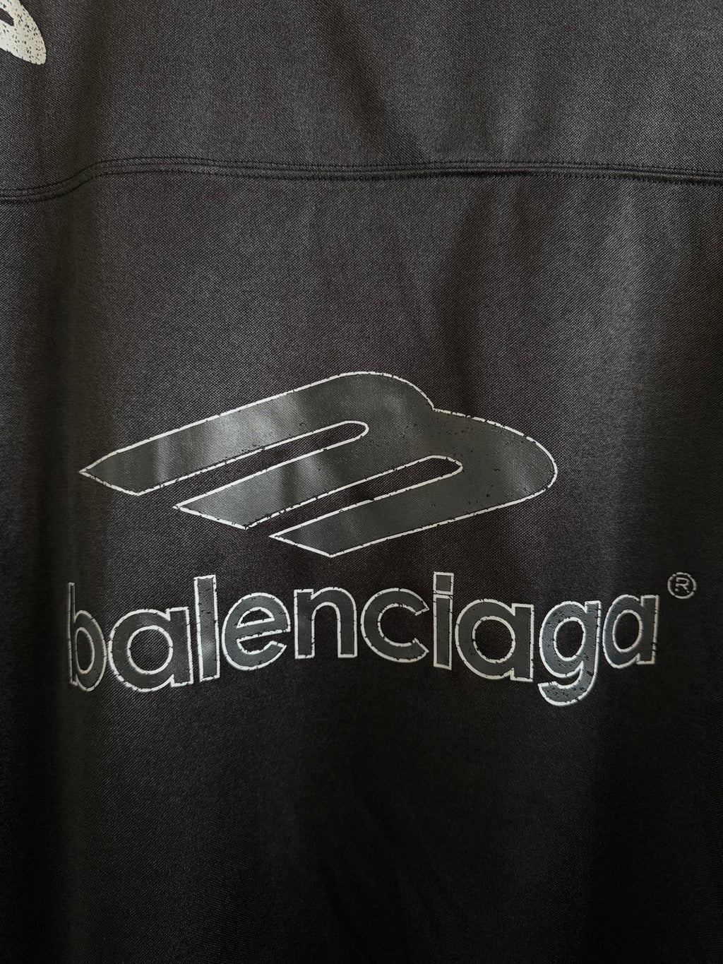 Black Balenciaga polo shirt with large 'balenciaga' logo print