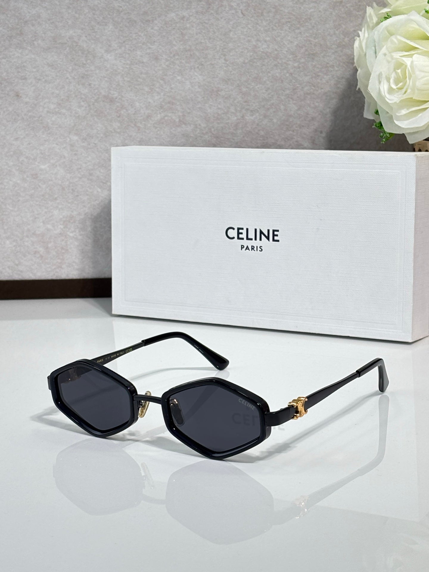 Celine black square-frame sunglasses with gold-tone temples and dark lenses