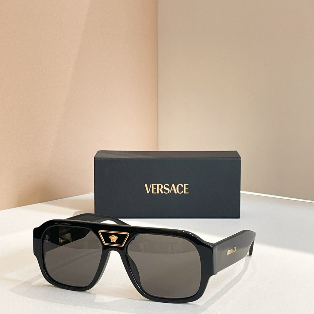 Versace sunglasses with black frames and dark lenses
