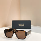 Versace sunglasses with tortoiseshell frames and brown-tinted lenses