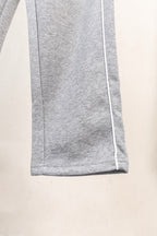 Moncler gray pants with straight leg and elastic cuff hem