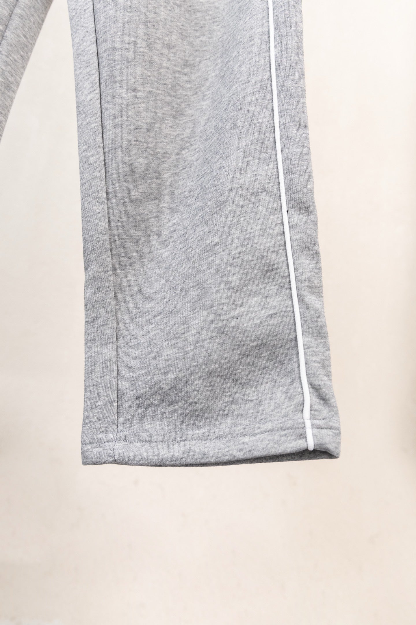 Moncler gray pants with straight leg and elastic cuff hem
