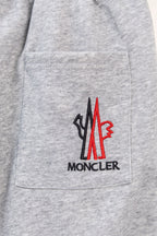Moncler gray sweatpants with front pocket and Moncler logo patch