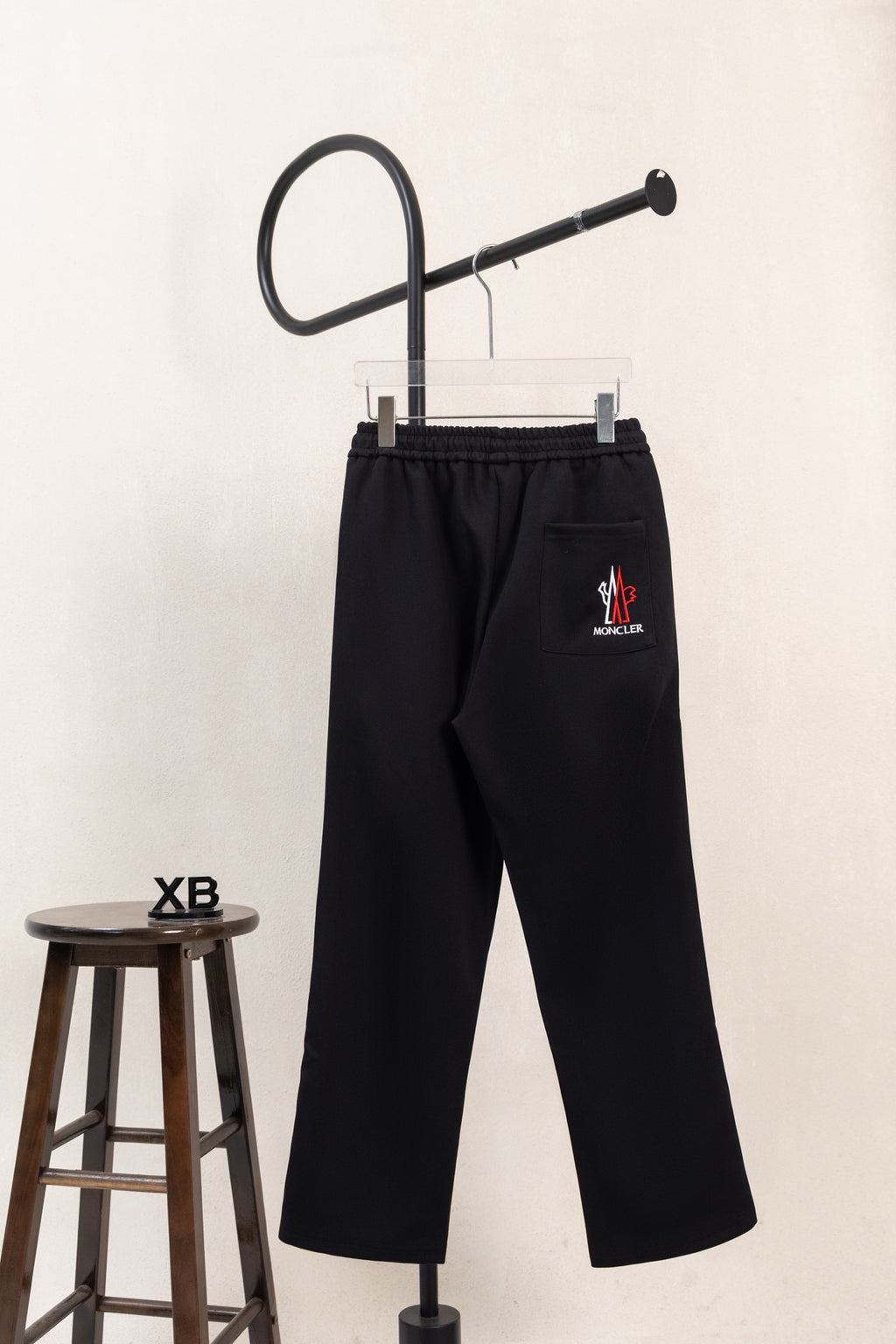 Moncler wide-leg pants, black with elastic waist and small logo patch