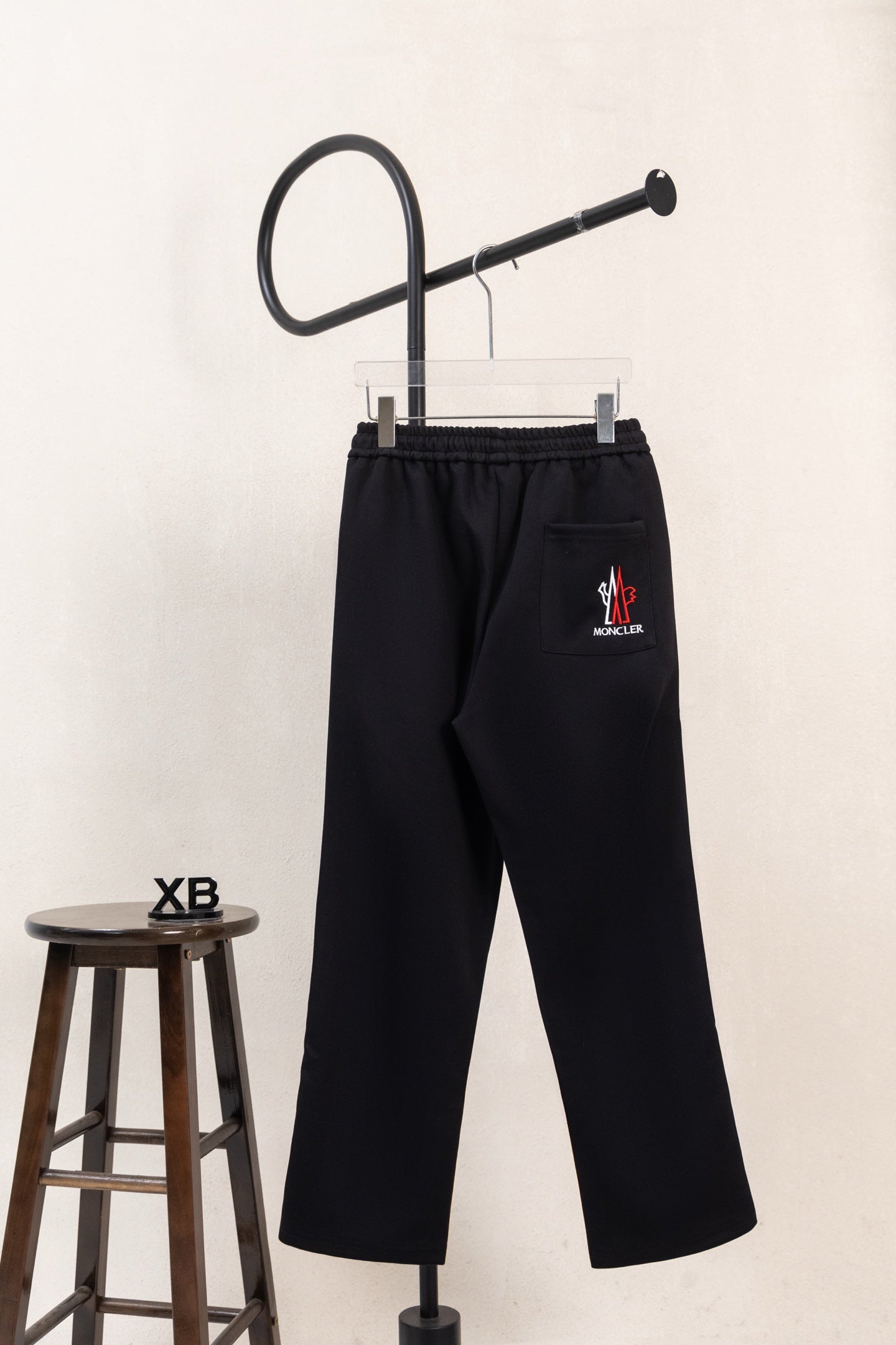 Moncler wide-leg pants, black with elastic waist and small logo patch
