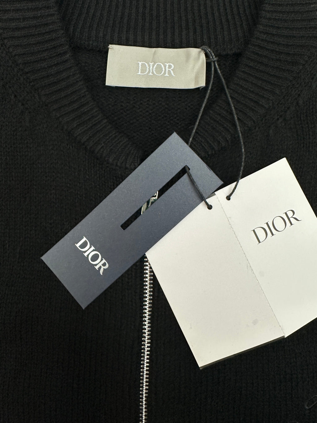 Dark ribbed knit collar with Dior label and white hang tags