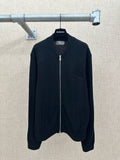 Zip-up knit jacket in dark color with stand collar, front zipper, and two side pockets